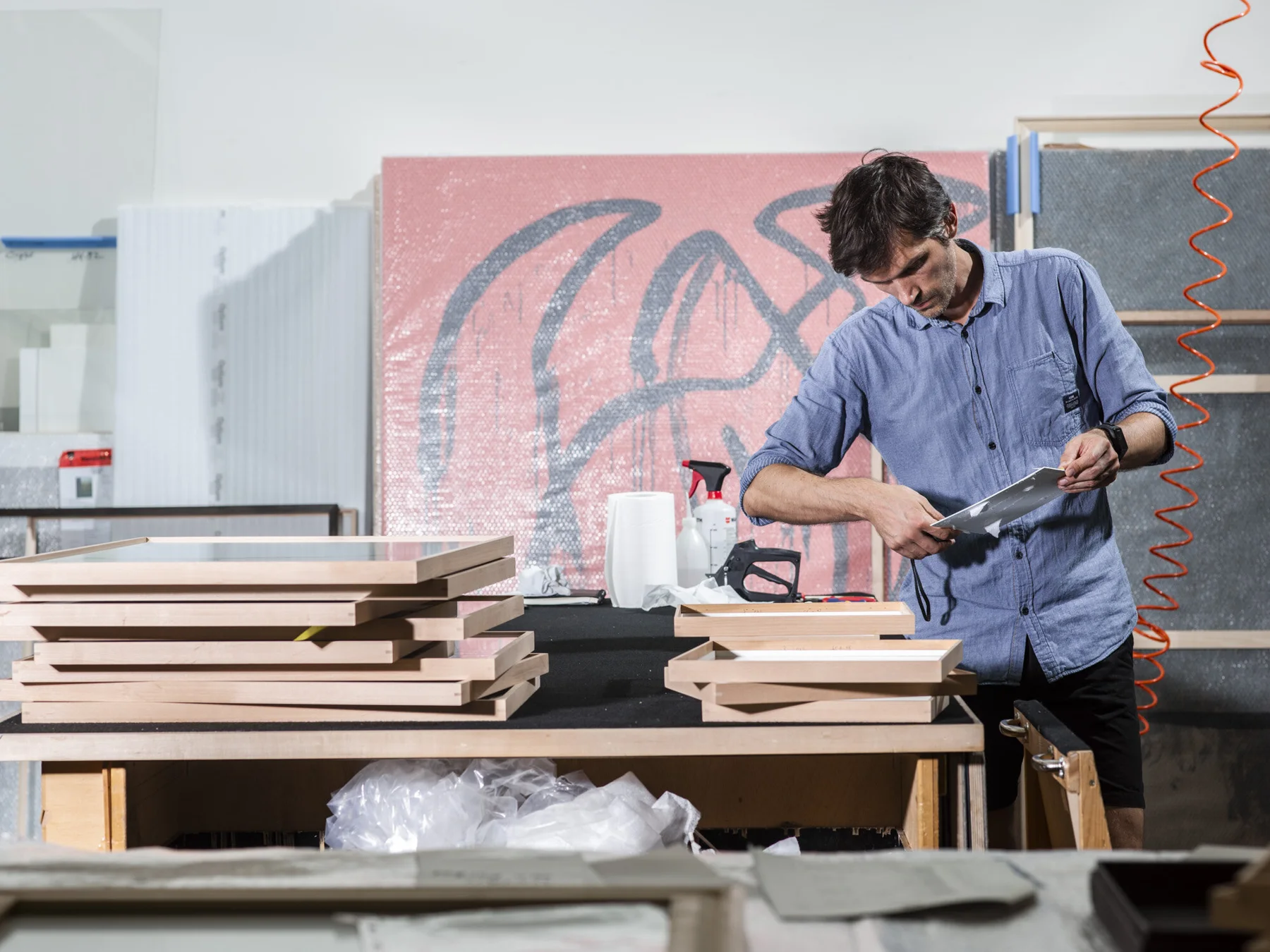 Handcrafted picture frames being made in a workshop
