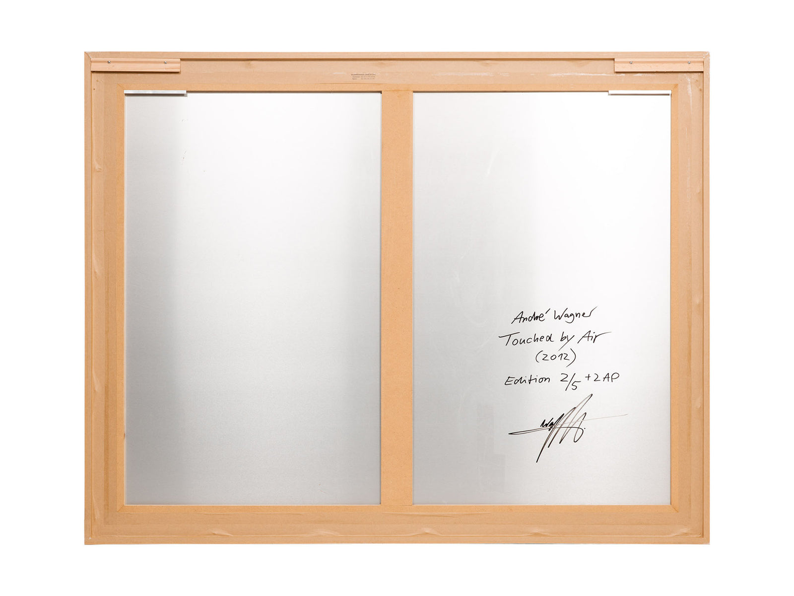 Reverse view of the photographic artwork “Touched by air, Schweiz” by André Wagner.