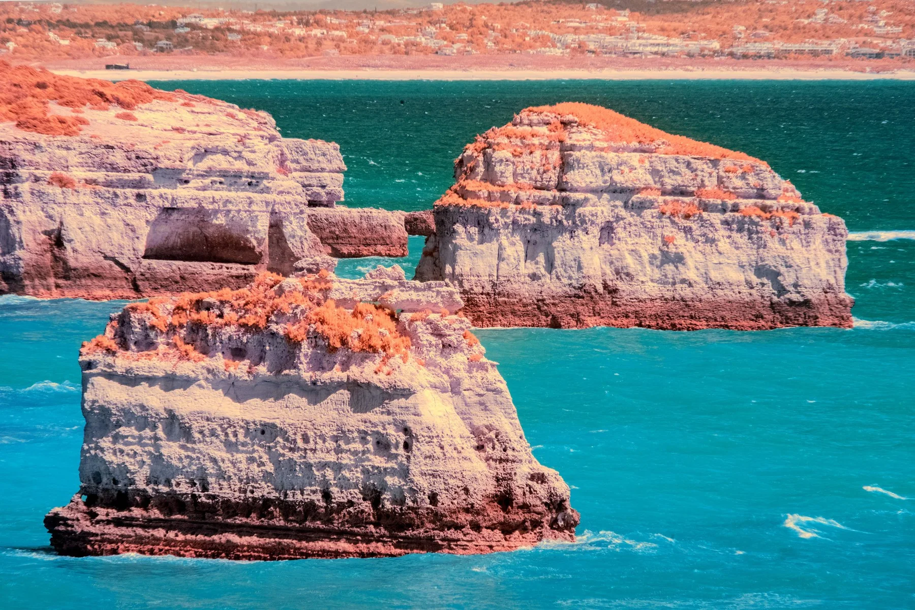Rock formations in the surf.