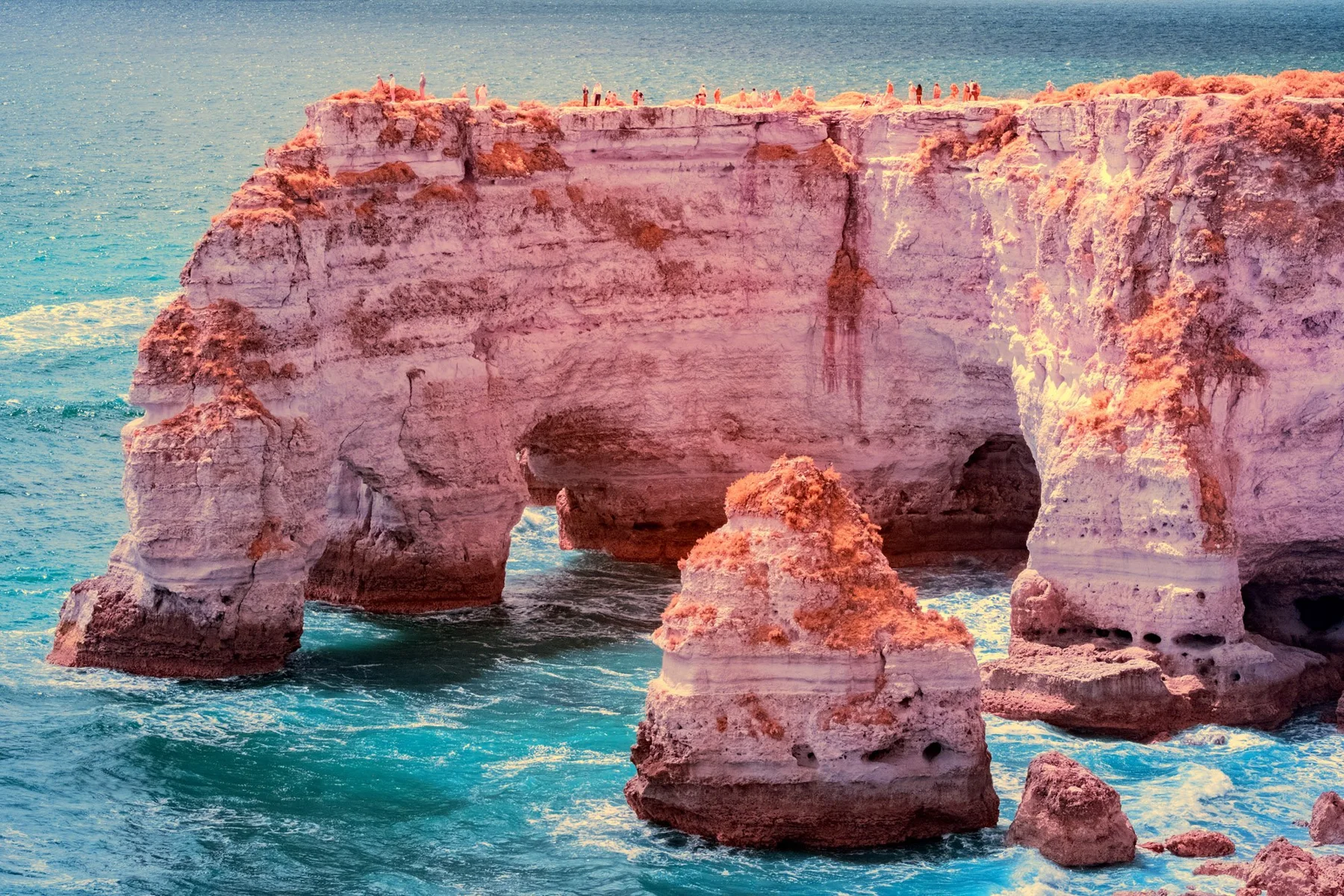 Natural rock arch on the coast.